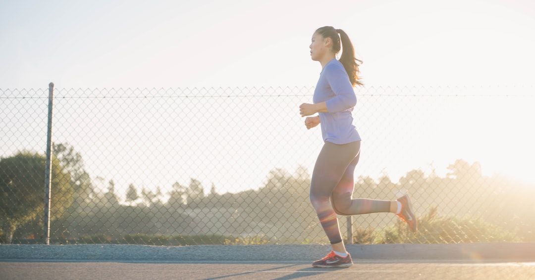 Walking Workout Plan cover showing a brisk walker on a sunrise path with step markers and a stopwatch