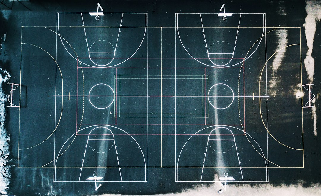 Cover illustration showing a basketball training program roadmap with skills, strength, speed, and season blocks